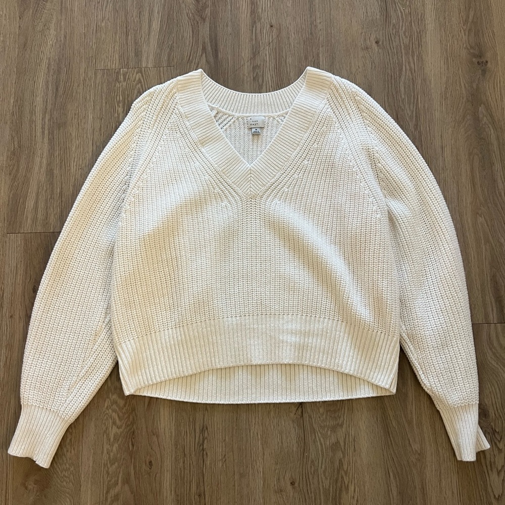 White v-neck sweater